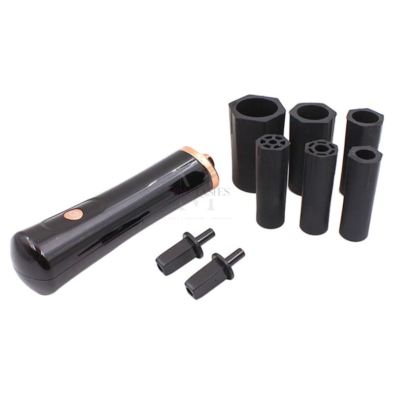 Electric lash glue shaker with multiple interchangeable adapter heads for different eyelash adhesive bottles.