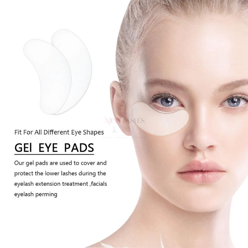 Eye gel pads applied under the eyes during eyelash extension treatment for lower lash protection.