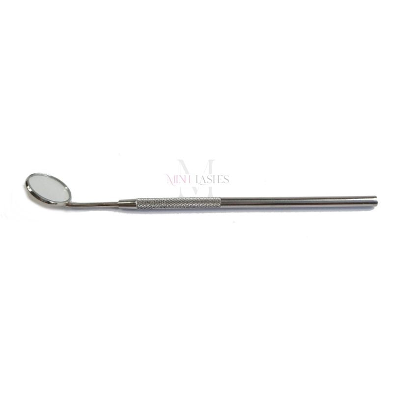 Stainless steel eyelash inspection mirror by Minh Lashes for checking lash extensions with precision.