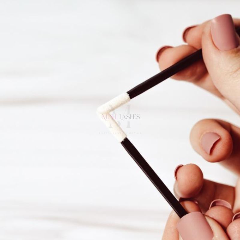 Bendable micro applicator demonstrating flexibility for accurate eyelash extension application.