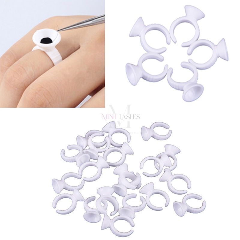 Disposable ring cup used by lash artists to hold adhesive or pigment during eyelash extensions.