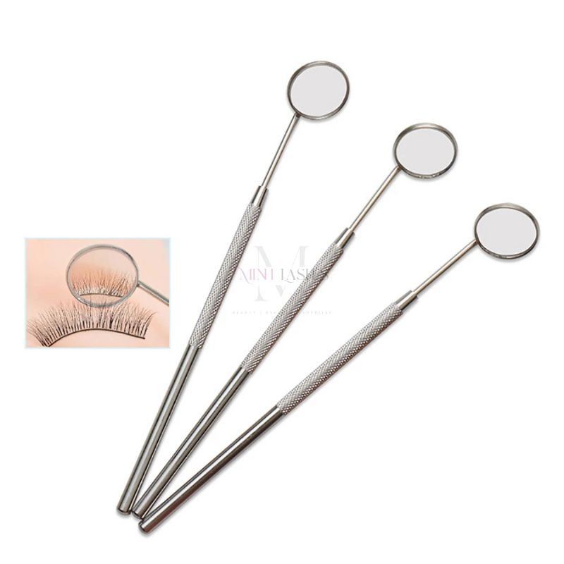 Stainless steel eyelash inspection mirror by Minh Lashes for checking lash extensions with precision.