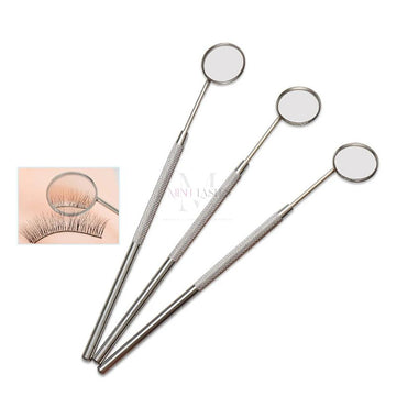 Stainless steel eyelash inspection mirror by Minh Lashes for checking lash extensions with precision.