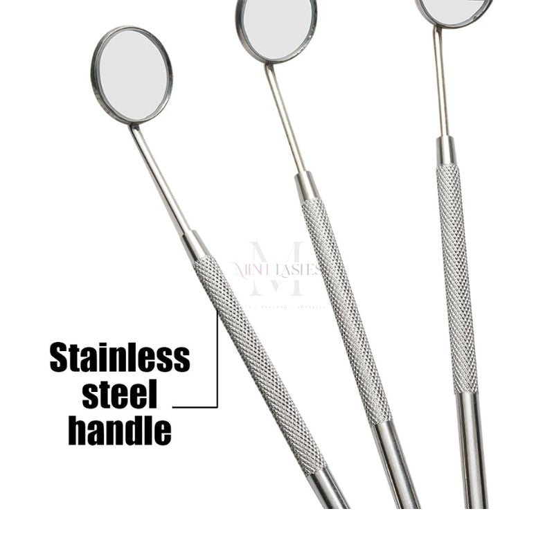 Textured stainless steel handle of eyelash inspection mirror for stable and comfortable use.