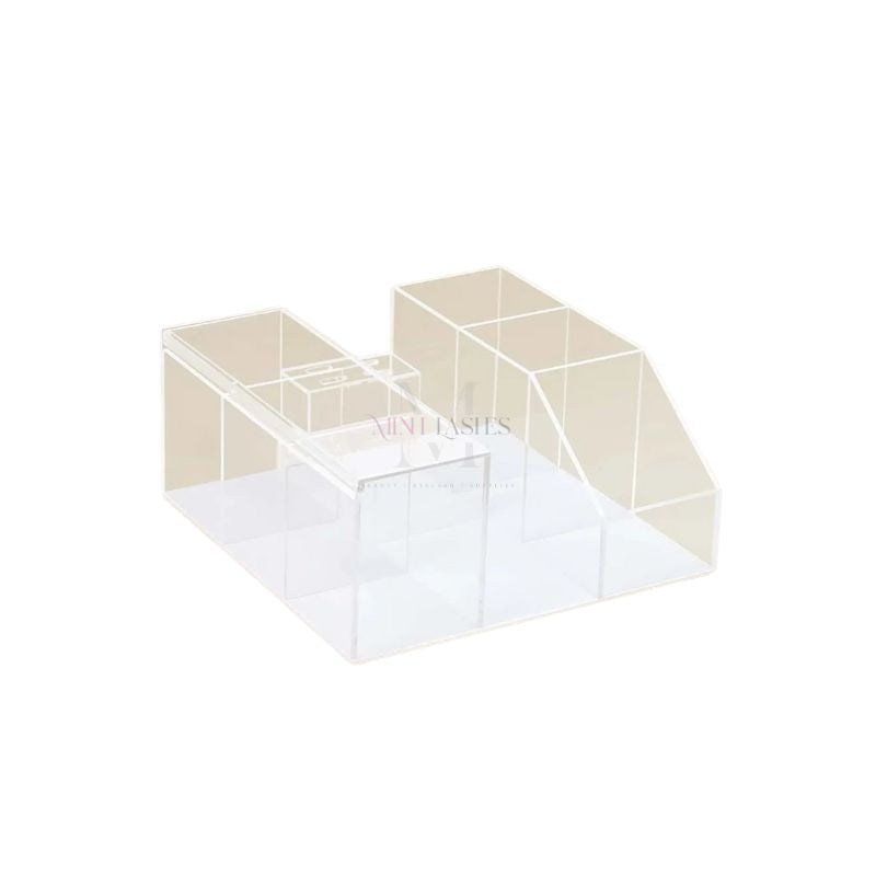 Empty clear acrylic lash organizer with multiple compartments for lash tools and accessories