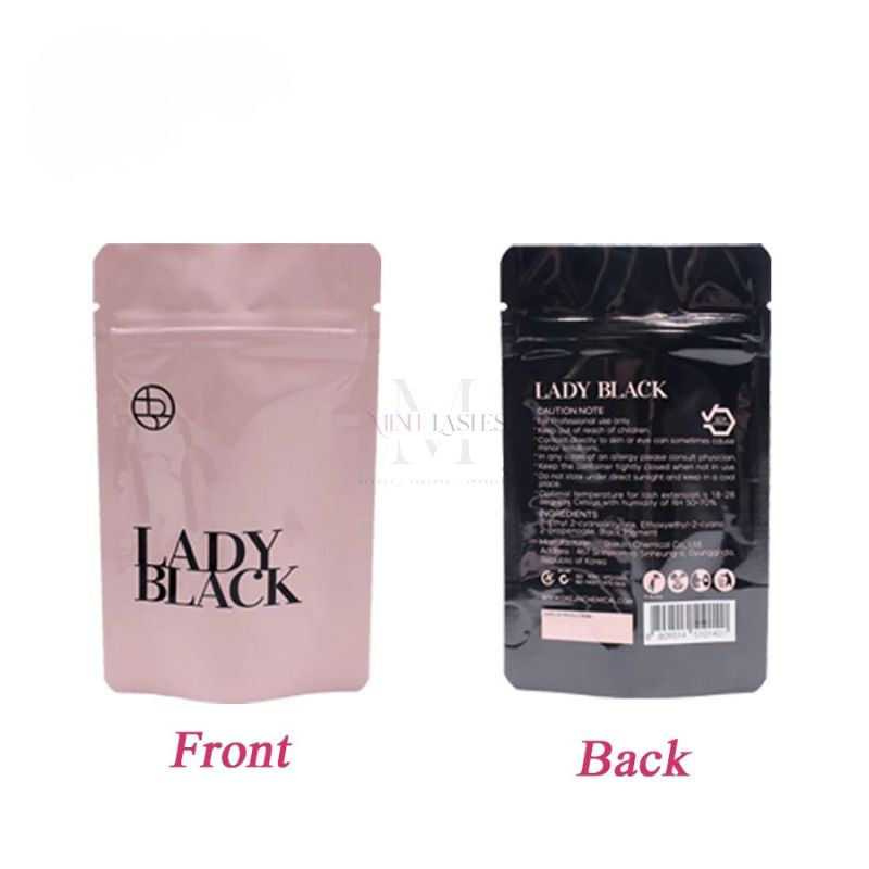 Front and back packaging of Lady Black eyelash extension glue pouch.