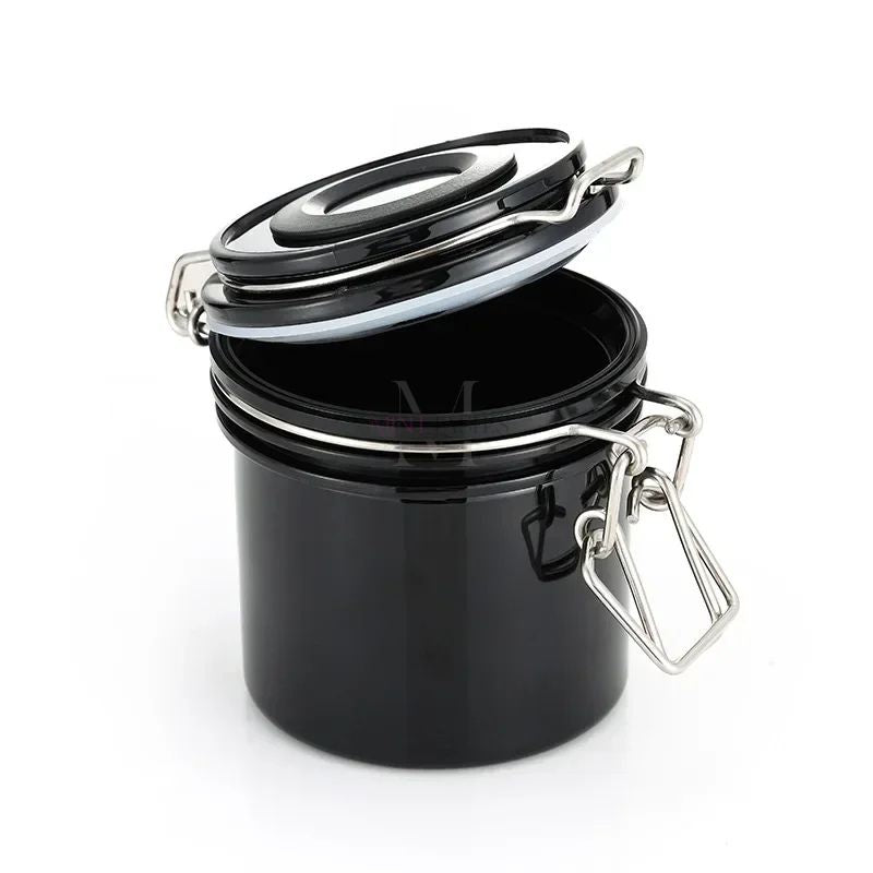 Open black lash glue storage tank with airtight sealing lid to protect eyelash adhesive from humidity.