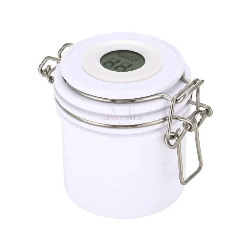 White lash glue storage tank with airtight design and digital hygrometer.